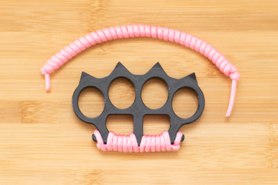 Black Brass Knuckles with Pink Paracord