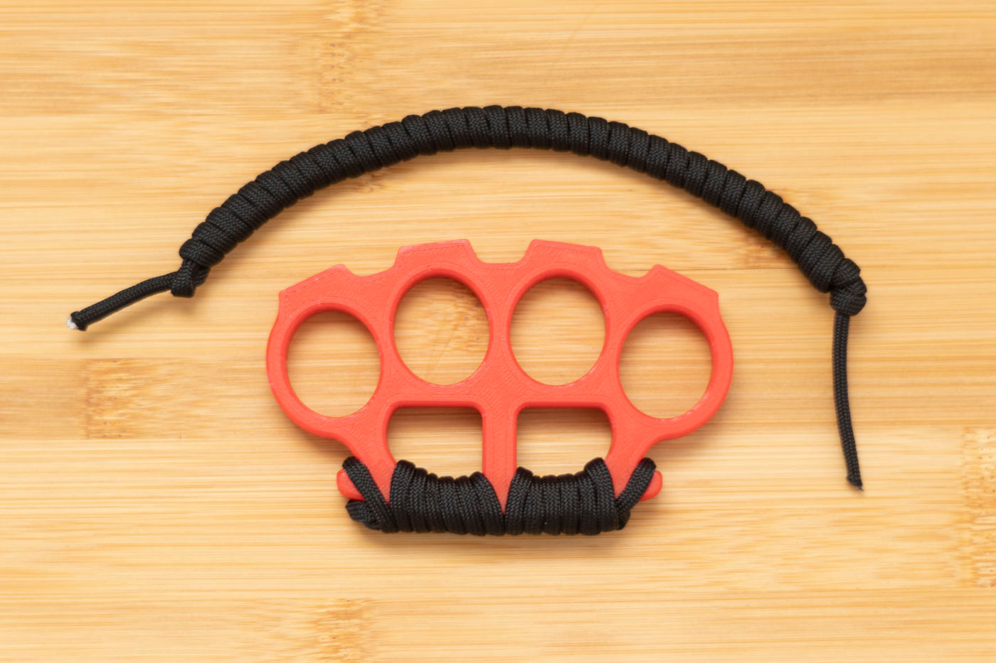 Brass Knuckles with Black Paracord