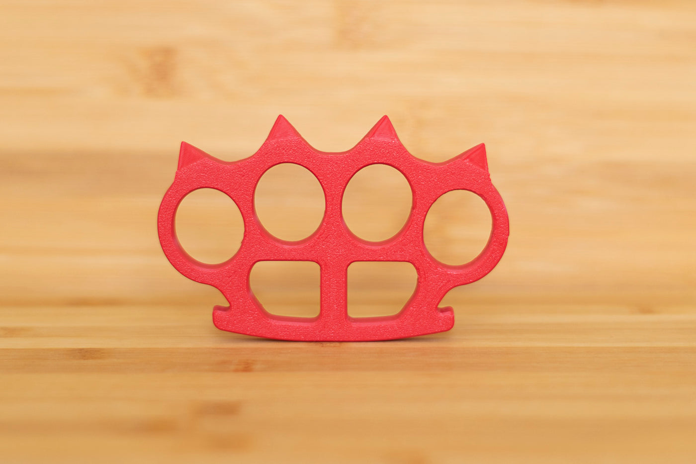 Spiked Brass Knuckles in Red
